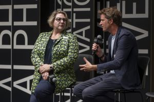 Due relatori sul palco di Alpha Innovation Live 2026 al NOI Techpark di Bolzano